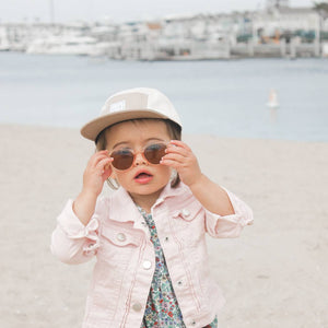 girl toddler modeling the Sand Five-Panel Hat