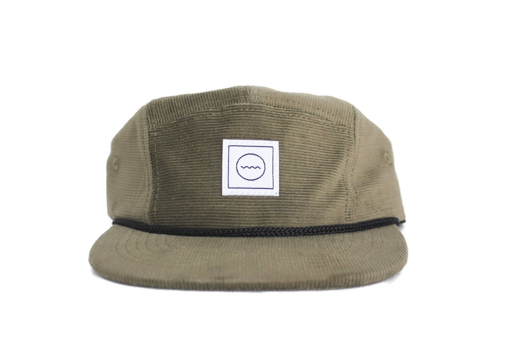 100% corduroy and adjustable velcro back.